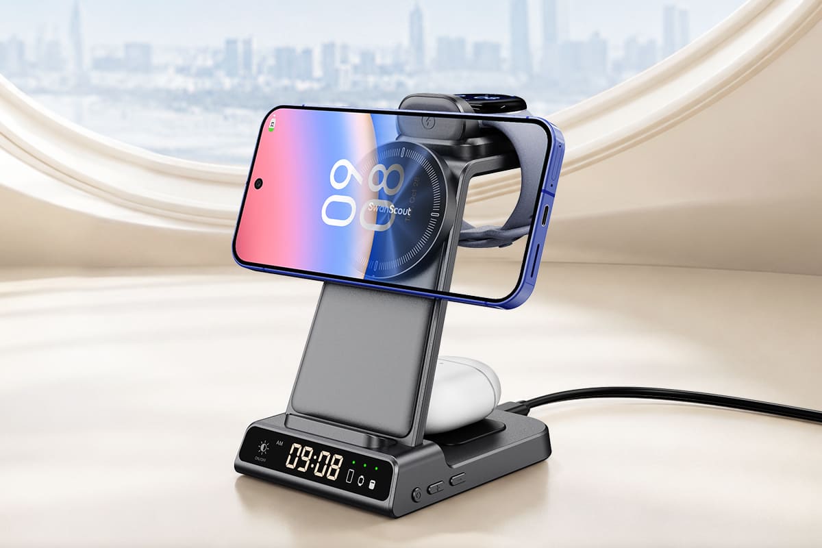 Pixel phone held in landscape mode on SwanScout C02MG4 while a watch and earbuds charge